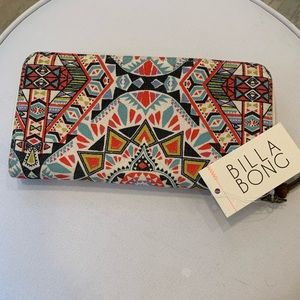 Soft and colorful cloth zippered wallet.